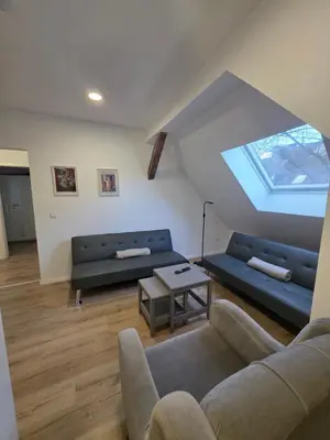 Ein Sitzbereich in der Unterkunft City Apart