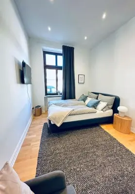 Ein Bett oder Betten in einem Zimmer der Unterkunft TOP Apartment in Elberfeld - Nähe DUS & Dortmund & Köln & Essen