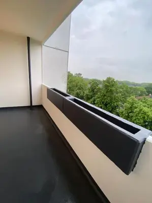 Ein Balkon oder eine Terrasse in der Unterkunft GrüneOase Balkon smartTV WiFi WaMa