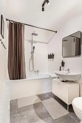 Ein Badezimmer in der Unterkunft Arena trifft Suite by Cordis Sky in direkter Umgebung zur Arena