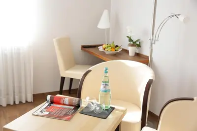 Ein Sitzbereich in der Unterkunft Landhotel Mutter Althoff