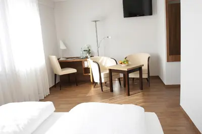 Ein Bett oder Betten in einem Zimmer der Unterkunft Landhotel Mutter Althoff
