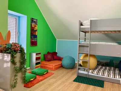 Ein Bett oder Betten in einem Zimmer der Unterkunft Wunderschöne Ferienwohnung in innovativem Zero-Emissionen Haus