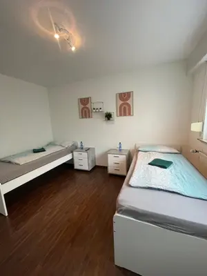 Ein Bett oder Betten in einem Zimmer der Unterkunft Moderne Monteurswohnung Bochum nahe der Autobahn