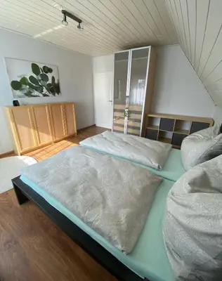 Ein Bett oder Betten in einem Zimmer der Unterkunft Ferienwohnung Steinhoff
