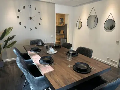 Ein Sitzbereich in der Unterkunft Geräumiges Apartment mit XXL Leinwand I Parkplatz I WiFi