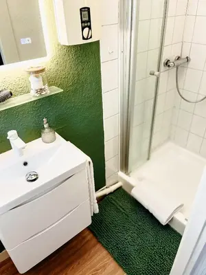 Ein Badezimmer in der Unterkunft MARA Life&Work am Uni Klinikum Fitness & Ambilight TV