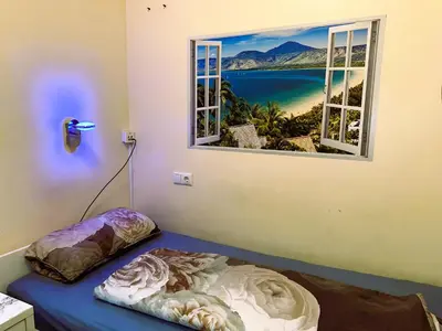 Ein Bett oder Betten in einem Zimmer der Unterkunft Modernes Apartment 1A
