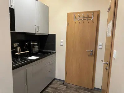 Küche/Küchenzeile in der Unterkunft Modernes Apartment 1A