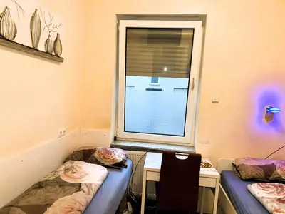 Ein Bett oder Betten in einem Zimmer der Unterkunft Modernes Apartment 1A