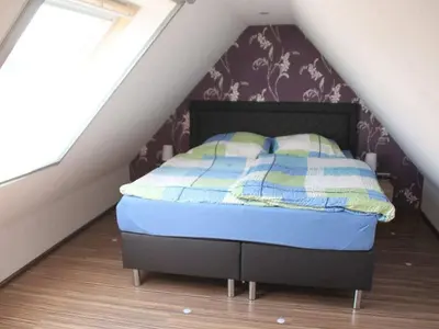 Ein Bett oder Betten in einem Zimmer der Unterkunft Wehner Comfortable holiday residence