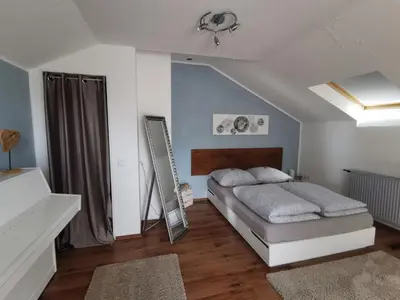 Ein Bett oder Betten in einem Zimmer der Unterkunft Urlaub im Ruhrgebiet
