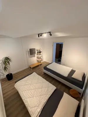 Ein Bett oder Betten in einem Zimmer der Unterkunft Zentrale 2-Zimmer Wohnung