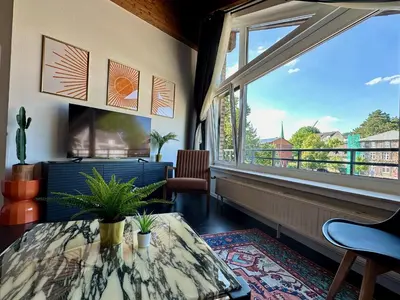 Ein Balkon oder eine Terrasse in der Unterkunft Orange Zebra Suite 4P mit Tiefgarage