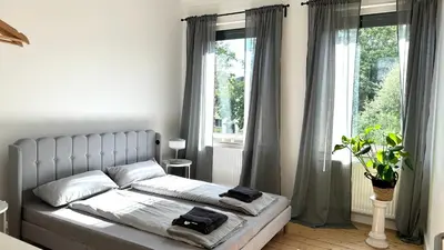 Ein Bett oder Betten in einem Zimmer der Unterkunft Apartment Savanna im historischen Stadtkern Linn in Krefeld, nähe Düsseldorf Messe, Airport, Parkmöglichkeiten direkt vor dem Haus