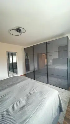 Ein Bett oder Betten in einem Zimmer der Unterkunft LeoMi Ferienwohnung