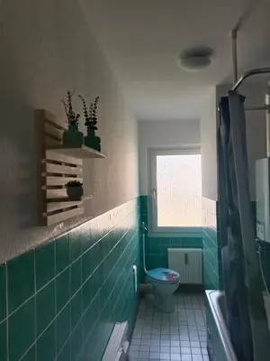Ein Badezimmer in der Unterkunft Nette Kuschelige Terrassen Wohnung