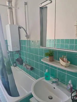 Ein Badezimmer in der Unterkunft Nette Kuschelige Terrassen Wohnung