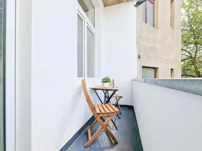 Ein Balkon oder eine Terrasse in der Unterkunft Tolstov Apartments - 3 Zimmer Wohnungen mit Balkon - 15 Min zur Messe DUS