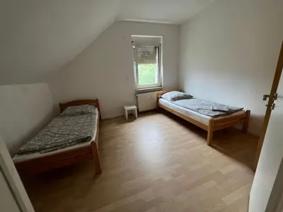 Ein Bett oder Betten in einem Zimmer der Unterkunft ES-Unterkunft