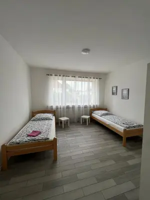 Ein Bett oder Betten in einem Zimmer der Unterkunft ES-Unterkunft