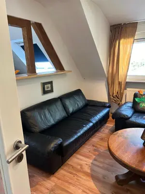 Ein Sitzbereich in der Unterkunft Ruhige Wohnung im Norden von Düsseldorf
