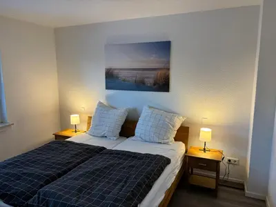 Ein Bett oder Betten in einem Zimmer der Unterkunft Ferienwohnung in Solingen-Mitte
