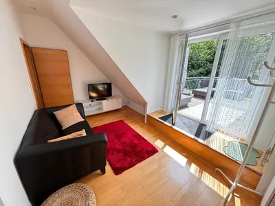 Ein Sitzbereich in der Unterkunft MESSE, Uniklinikum, Grugapark - Charmante Wohnung mit Dachterrasse in guter Lage