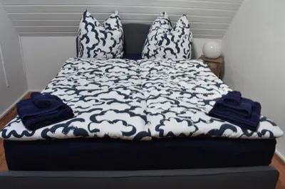 Ein Bett oder Betten in einem Zimmer der Unterkunft Schöne Wohnung in Oberhausen