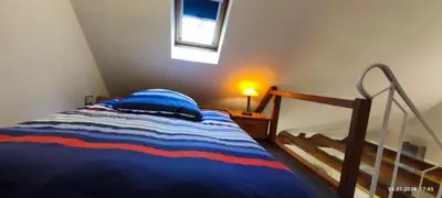 Ein Bett oder Betten in einem Zimmer der Unterkunft DIE HOTELALTERNATIVE DELUXE APP erste Etage mit 2 Schlafzimmer Haus 63