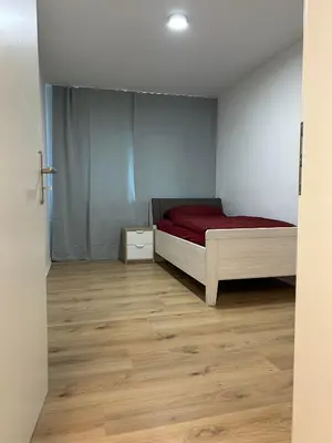 Ein Bett oder Betten in einem Zimmer der Unterkunft Monteur-Lounge
