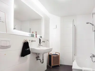 Ein Badezimmer in der Unterkunft Maracoon - Design-Apartments mit Küche, Garten, Self-Checkin