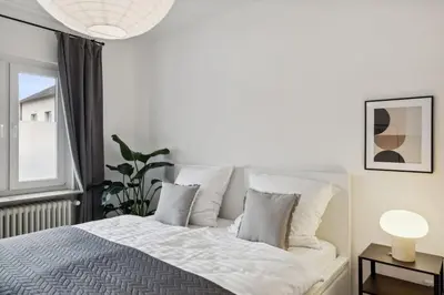 Ein Bett oder Betten in einem Zimmer der Unterkunft Schicke grosse Wohnung Apartment Wuppertal Ronsdorf- Nähe DUS & Dortmund & Köln & Essen