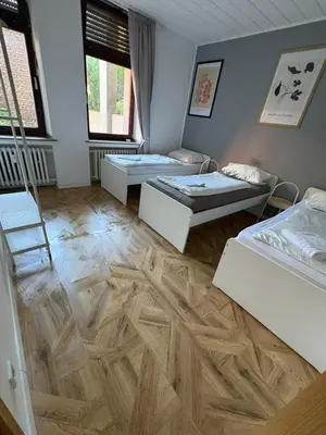Ein Bett oder Betten in einem Zimmer der Unterkunft Duisburg Studio by TM
