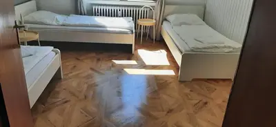 Ein Bett oder Betten in einem Zimmer der Unterkunft Duisburg Studio by TM