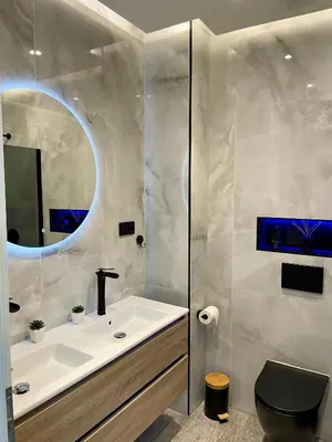 Ein Badezimmer in der Unterkunft Aura Apartment und Spa Oberhausen