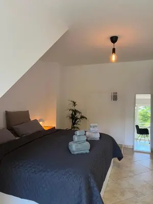 Ein Bett oder Betten in einem Zimmer der Unterkunft Lichtdurchflutetes Appartement im zentralen Ruhrgebiet