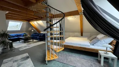 Ein Bett oder Betten in einem Zimmer der Unterkunft Loftapartment Wuppertal