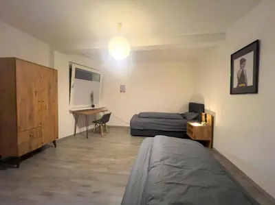 TV/Unterhaltungsangebot in der Unterkunft Livemore24 - Apartment 5 in Duisburg WLAN - Smart-TV - 24-7 Check-in und Küche