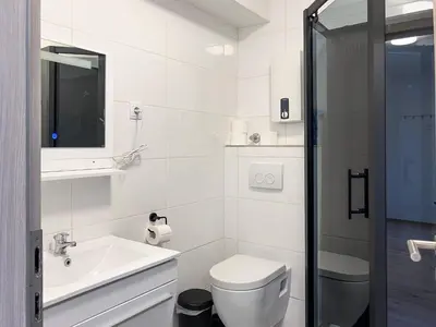 Ein Badezimmer in der Unterkunft T&K Apartments near Messe Fair Trade Düsseldorf und Airport 1A