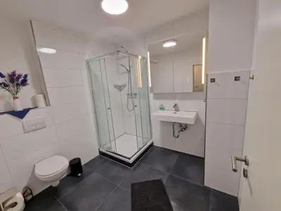 Ein Badezimmer in der Unterkunft Moers City Apartments OG