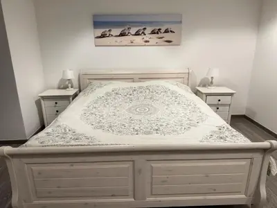 Ein Bett oder Betten in einem Zimmer der Unterkunft 2 Zimmer Apartment am Zoo mit Garten