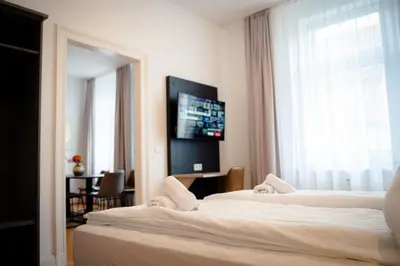 Ein Bett oder Betten in einem Zimmer der Unterkunft Gemütliche Wohnung by Junik Apartments