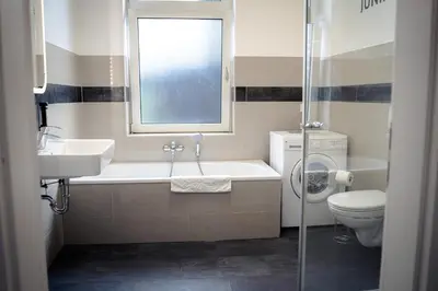 Ein Badezimmer in der Unterkunft Gemütliche Wohnung by Junik Apartments
