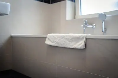 Ein Badezimmer in der Unterkunft Gemütliche Wohnung by Junik Apartments