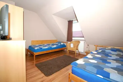 Ein Bett oder Betten in einem Zimmer der Unterkunft Ferienwohnung in Bochum