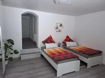 Ein Bett oder Betten in einem Zimmer der Unterkunft Ferienwohnung Unterrath