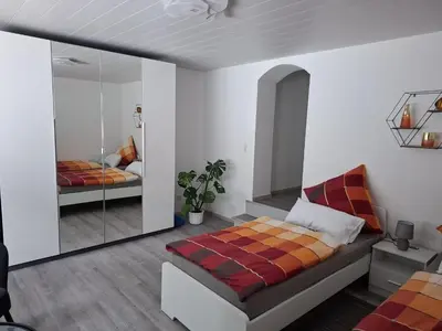 Ein Bett oder Betten in einem Zimmer der Unterkunft Ferienwohnung Unterrath