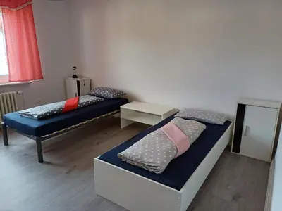 Ein Bett oder Betten in einem Zimmer der Unterkunft K&K Unterkunft GbR