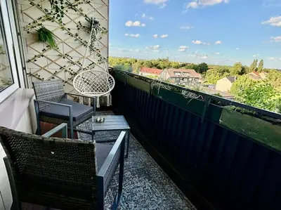 Ein Balkon oder eine Terrasse in der Unterkunft SuperSuite Boho 2Bdr Apartment Balkon Aufzug